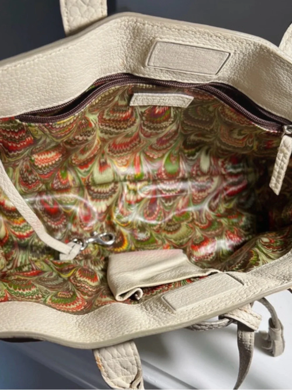 Dooney & Bourke Cream Pebbled Leather Shoulder Bag with Charm
